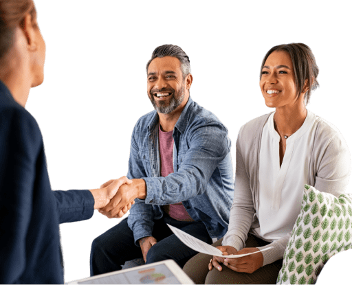 A man and woman shake hands with a finance broker, symbolizing collaboration and agreement in a professional setting.