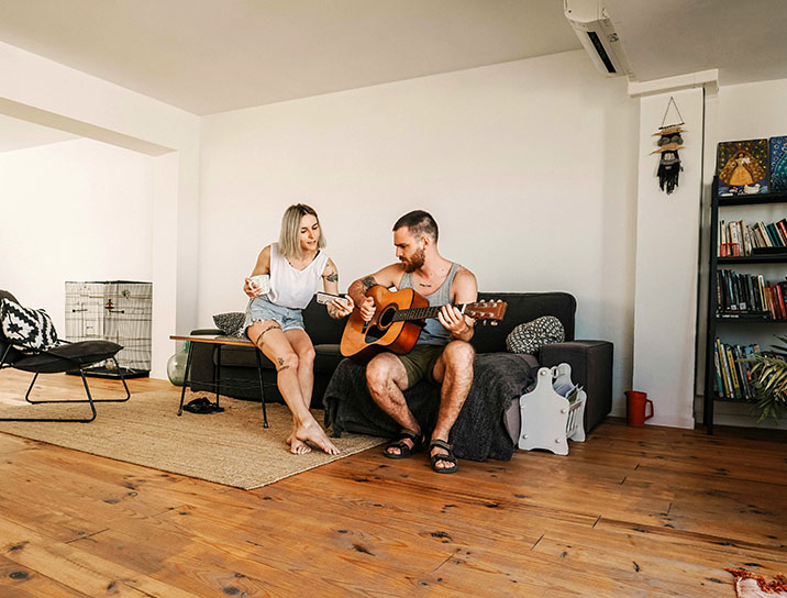 Young couple in living room