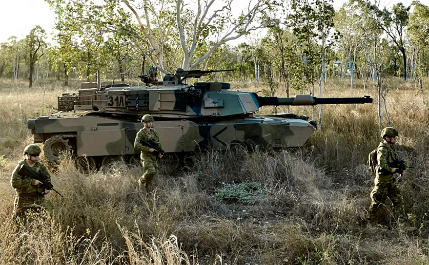 Three Australian Army soldiers and an M1 Abrams tank